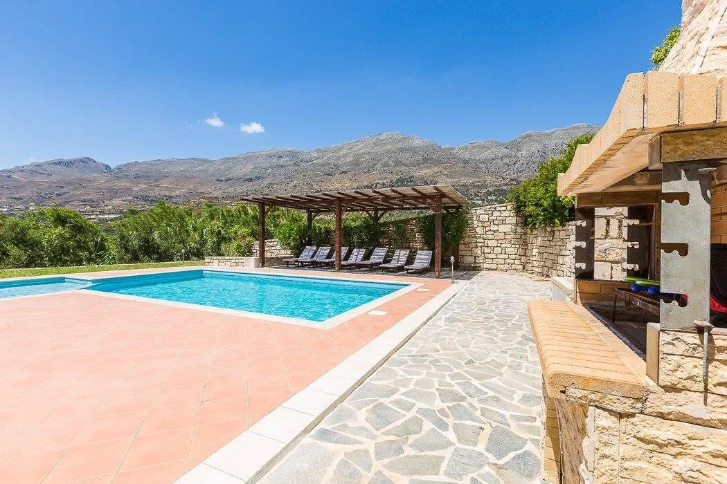 Stone-paved pool terrace